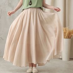 "you can wear it as a casual skirt for travelling, having a picnic with your friends, dating and shopping, Perfect for lazy days that you want to sustain a chic and stylish appearance. DETAIL * More colors available https://etsy.me/2T1UpyE * 75% linen, 25% cotton * Cotton liner * Elastic waistband * Without pockets * pleated waist detail * Plus size skirt * Circle skirt * Perfect summer spring skirt * Dry clean * The model is 170cm (5′7″) tall with a 80cm (31.5\") bust, 66cm (26\") waist. She is Beige Non-stretch Tiered Skirt, Summer Plain Relaxed Fit Skirt, Casual Plain Maxi Skirt For Spring, Plain Summer Skirt, Casual Plain Long Skirt, Casual Relaxed Fit Plain Skirt, Non-stretch Beige Skirt For Summer, Beach Flared Skirt Solid Color, Summer Non-stretch Beige Skirt