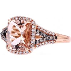 A symphony of style awaits in this Blushing Beauty 14K Rose Gold MoRose Goldanite Ring. Imagine slipping this exquisite piece onto your finger, its soft hues of rose gold perfectly complementing the captivating allure of the moRose Goldanite centerpiece. With a total carat weight of 1.90 Carats, the moRose Goldanite gemstone exudes elegance and grace, drawing attention with every movement of your hand.Encircling the moRose Goldanite are delicate diamonds, totaling 1/4 Carat in weight, adding a subtle sparkle that enhances the ring's enchanting appeal. Crafted with precision and finesse, the 14K rose gold setting ensures durability and longevity, making this ring not only a stunning accessory but also a timeless investment in your jewelry collection.Whether you're treating yourself or searc Luxury Pink Gold Rings With Accent Stones, Luxury Rose Gold Diamond Ring With Gemstone, Elegant Morganite Ring For Formal Occasions, Elegant Morganite Rings For Formal Events, Formal Rose Gold Morganite Diamond Ring, Luxury Pink Gold Ring With Center Stone, Luxury Pink Gold Rings With Center Stone, Luxury Rose Gold Morganite Diamond Ring, Luxury 14k Rose Gold Diamond Ring