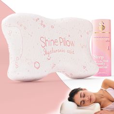 a woman laying on the ground next to an inflatable pillow and bottle of deodorant