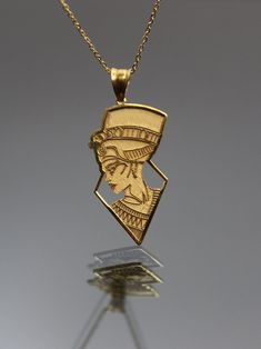 Nefertiti 14k 18k Real Gold Necklace - Egypt Nefertiti Pendant - African Symbol - Egyptian Pharaoh - Gold in Nefertiti ▶ 14K Solid Gold (585) ▶ 18K Solid Gold (750) ▶ Options: White,Rose,Yellow ▶ You can buy this necklace without chain. ABOUT NECKLACE Handmade with 14k/18k solid real gold. You can order this Queen Nefertiti gold necklace with 3 different color options, 5 different necklace length options and free & express shipping to the all-around the world. What is 14k Gold? 14K gold is a mix Egyptian Gold Jewelry, Egypt Necklace, Nefertiti Pendant, Nefertiti Necklace, Egypt Jewelry, Real Gold Necklace, African Symbols, Egypt Fashion, Egyptian Necklace