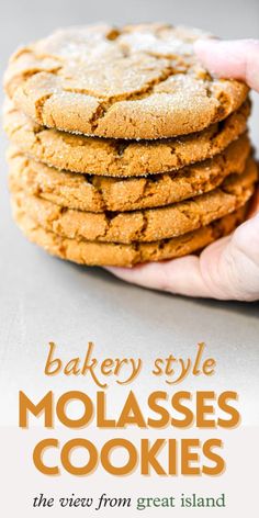 a hand holding a stack of cookies with the title bakery style molasses cookies