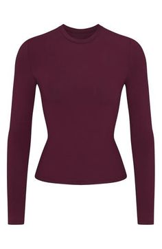 A tried-and-true classic, this fitted long-sleeve T-shirt cut from stretch-enhanced cotton jersey is from Kim Kardashian's highly sought-out SKIMS collection. 21" regular length (size Medium) Crewneck Long sleeves 90% cotton, 10% elastane Machine wash, tumble dry Imported