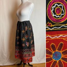 "This has a lot of charm! A very black, somewhat heavy cotton peasant style skirt with embroidery all around. Some of which includes little rooster/ chicken figures. It's very vibrant & colorful. In excellent condition. Seems unworn and or very original. Semi structured weighted cotton.  I feel the size is somewhat open, small to a medium. Please check measurements below.  It's in great shape.  ✏️ ✏️✏️DETAILS ✏️✏️✏️ Brand: hand made/ none Size on tag:- Fits like: Small to medium  Color:  black w Black Cotton Skirt With Floral Embroidery, Traditional Cotton Skirt For Festival, Black Cotton Bohemian Skirt, Black Bohemian Cotton Skirt, Traditional Black Skirt For Summer, Black Cotton Skirt For Festival, Traditional Embroidered Black Skirt, Traditional Black Embroidered Skirt, Traditional Black Cotton Skirt