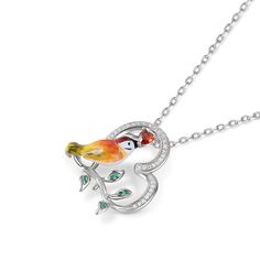 Designed for the free-spirited, the kingfisher is symbolic of freedom, courage, adventure, and balance. Each piece has been delicately hand-painted, displaying the uniqueness of its bright yellow feathers and orange plumage against a silver base. It is a true gift to spot one of these elusive creatures in nature.Carat Weight: 0.341 ctStone Size: 1,3*3,0.8 mmStone Type: Jeulia® StoneNumber of Stones: 44 Stone Shape: Round, HeartStone Color: Diamond White, Garnet RedChain Type: Cable chainWeight: Unique Bird Design Pendant Jewelry, Green Bird Design Jewelry Gift, Green Jewelry With Bird Design As Gift, Green Jewelry With Bird Design For Gift, Whimsical Artistic Jewelry For Gifts, Whimsical Artistic Design Jewelry Gift, Whimsical Artistic Design Jewelry For Gift, Whimsical Bird Design Jewelry For Gifts, Whimsical Bird Design Jewelry For Gift