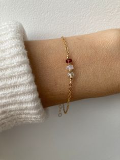 This dainty bracelet features the gentle essence of moonstone, tourmaline and aquamarine  that are associated with fertility and a healthy pregnancy. D E T A I L S *Made with a trio of AAA quality gemstones that measure between 3.5 and 4.5mm. *Choose between a stainless steel chain available in gold, silver, rose gold or a 14k gold filled chain, rose gold filled or sterling silver chain. *The gemstones included are moonstone, aquamarine and pink tourmaline. *Bracelet comes with care instructions an explanatory crystal information card and as with all our products is gift ready. S I Z I N G * H E L P Choose the length you prefer from the drop down menu. Use the length guide as a reference. This bracelet is adjustable as a snug fit will work best for this bracelet to stop it rolling. This me Dainty Moonstone Bracelets With Natural Stones, Dainty Moonstone Bracelet With Natural Stones, Dainty Everyday Crystal Birthstone Bracelet, Everyday Dainty Birthstone Crystal Bracelet, Dainty Birthstone Bracelets For Healing, Dainty Hypoallergenic Healing Bracelet, Dainty Moonstone Bracelets For Everyday, Everyday White Birthstone Bracelets, Everyday White Birthstone Bracelet