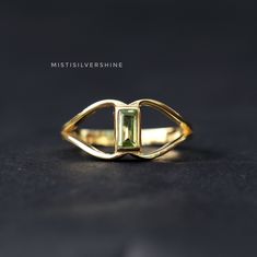 Natural Peridot Ring, 18k Gold Plated Ring, 925 Sterling Silver Ring, Peridot Gold Ring, Women's Silver Ring, Bohemian Ring, Gift For Her Metal: 925 Sterling Silver Gemstone : Natural Peridot Stone Color : Green Stone Shape : Baguette Stone Setting: Bezel Benefits of wearing Peridot:- Peridot is known to provide you with good health and healing. You would gain strength, metabolism, and tissue and cell regeneration if you wore Peridot Jewelry. Also, this gem is thought to regulate your endocrine Peridot Jewelry, Bohemian Ring, Peridot Stone, Bohemian Rings, Peridot Ring, Boho Ring, Plated Ring, Gold Plated Rings, Rings Statement