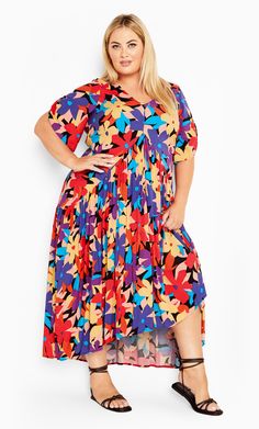 Stroll through any season in style with the Val Print Dress. The short sleeves bring a sweet touch to your style. Along with a tie back detail and a V gathered design to the waist, this dress is sure to make hearts stutter. Key Features Include: - V-neckline - Short sleeves - V gathered detail to waist - Tie back detail - Relaxed fit - Pull over style - Maxi length | Plus Size Dress Val Print In Urban Bloom | Size 18 | Avenue Occasion Dresses Wedding Guest, Maxi Dress Plus Size, Cute Maxi Dress, Resort Dresses, Under Dress, Plus Size Maxi Dresses, Comfortable Dress, Swim Dress, Plus Size Dress