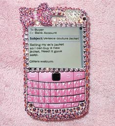 a pink cell phone covered in lots of swarong