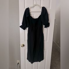 New | Never Worn | Original Tag Is Gone But Never Worn | Perfect For Family Photos | Smocked | Pockets | Super Forgiving | On A Taller Person, It Would Be A Midi Dress Below The Knee. On A Shorter Person, It Would Be A Long Dress | Sleeves Can Be Work On Or Off Shoulders | Double Lined In The Skirt Area Short Person, Tall Person, Long Midi Dress, Shoulder Sleeve, Smocking, Off The Shoulder, Family Photos, Off Shoulder, Black Dress