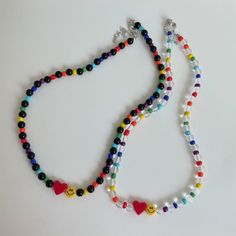 Trendy Black Heart Beads Jewelry, Trendy Black Jewelry With Heart Beads, Trendy Black Necklace With Colorful Beads, Trendy Heart-shaped Beaded Necklace With Colorful Beads, Trendy Heart-shaped Colorful Beaded Necklace, Trendy Heart-shaped Multicolor Beaded Necklace, Trendy Multicolor Heart-shaped Beaded Necklace, Trendy Multicolor Heart Beaded Necklace, Trendy Black Beads For Gifts