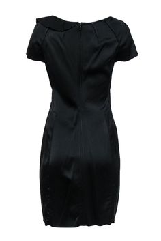 Add some flare to a closet favorite with this frock from Zac Posen! The classic LBD is given a chic twist with whimsical ruffles. A timeless classic with a modern makeover. Whether you're headed to a cocktail party or networking event, you'll rock this piece with a sleek pair of pumps and a sparkly clutch. Size 8 Shell: 50% Cotton, 50% Silk Lining: 100% Polyester Concealed back zipper Lined Sheath silhouette Square neckline w/ ruffled design Short sleeves Bust 34" Waist 29" Sleeve length 6" Shou Sparkly Clutch, Networking Event, Zac Posen, Size 8 Dress, Timeless Classic, Black Shorts, Cocktail Party, Sheath Dress, Ruffles