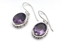 Amethyst Earrings // Oval Bali Setting Length: 1.25 inches Weight: 4 grams Metal: 925 Sterling Silver Finish: oxidized Stone: Amethyst Hypoallergenic Hallmark 925 Handmade Oval Purple Earrings, Oval Amethyst Earrings For Gift, Oval Sterling Silver Crystal Earrings, Purple Amethyst Earrings, Bali Earrings, Bali Silver, Swirl Ring, Earrings Purple, February Birthstone