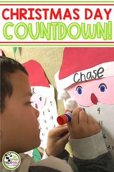 a young boy is making a christmas count down activity