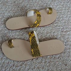 Tibi Cedric Yellow Snake-Embossed Toe Slide Sandals Size 38 Beautiful Tibi Flat Sandals In Yellow With Stunning Snake-Embossed. Toe Slide Sandals. Leather Upper & Sole. Size 38 Made In Spain ***Please Review The Last 2 Photos, Right Slide Show Some Damages At The Heel, Not Noticeable When Wore.*** Yellow Snake, Slide Show, Sandals Leather, 2 Photos, Yellow Black, Black N Yellow, Flat Sandals, Slide Sandals, Emboss