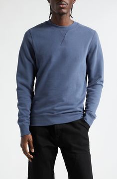 Classic and comfortable, this sweatshirt cut from cotton French terry makes a great layer and promises to age with you like a well-loved old friend. 27 1/2" length (size Medium) Crewneck Banded cuffs and hem 100% cotton Machine wash, dry flat Made in Portugal Designer Clothing Washed Blue Sweatshirt With Ribbed Cuffs, Soft-washed Blue Sweatshirt For Fall, Washed Blue Crew Neck Sweatshirt Soft-washed, Sporty Washed Blue Sweatshirt With Relaxed Fit, Washed Blue Crew Neck Sweatshirt For Fall, Soft-washed Crew Neck Sweater For Layering, Washed Blue Crew Neck Sweatshirt For Winter, Blue Washed Crew Sweatshirt, Blue Crew Sweatshirt For Layering