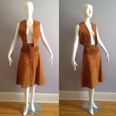 Vintage 1970s Brown Suede Cropped Vest And Chevron Striped Skirt Very Boho Hippie Vest Is Slightly Cropped With No Openings Button Front A Line Skirt Only Tag Is On Skirt Overall Good Vintage Condition Age Appropriate Minor Wear Tag Reads: US 11/12  Canada 13/14 Best Fit Approximately A Modern Small - M Please Refer To Measurements To Ensure Best Fit Lying Flat, In Inches Vest Shoulders: 15 Underarms: 17 Total Length: 17 Skirt Waist: 14 Hips: 21 Length: 28 Vintage Fitted Pleated Skirt, Fitted Vintage Mini Skirt, Vintage Skirt For Fall, Fitted Vintage Skirt For Vintage Fashion, Fitted Vintage Skirt For Fall, Vest Festival Outfit, Suede Vest Outfit, Outfit References, Vest Skirt