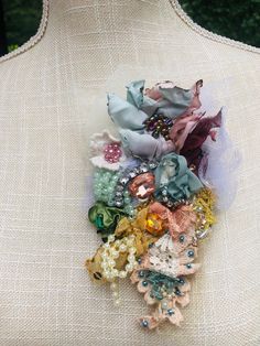 a woman's back with an assortment of hair accessories on it