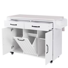 a white kitchen island with two drawers and one door open to reveal the bottom drawer