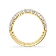 a yellow gold wedding band with rows of diamonds