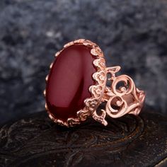 Handmade Rose Gold Red Yemeni Aqeeq Women Ring. Handmade in 925 sterling silver with agate stone. On the ring D-shape Red Aqeeq - Agate stone settled. Rose gold color plated 925 sterling silver. The dimensions of the stone are 18 mm x 13 mm. The average weight of the Handmade Rose Gold Plated Red Yemeni Aqeeq Women Ring is 7 gr. (depending on your ring size). The back side is open and the stone touches your skin. Classic and exclusive style. Stone Type: Aqeeq - Agate Stone Color: Red Stone Dimen Elegant Carnelian Ring For Formal Occasions, Elegant Agate Ring For Formal Occasions, Elegant Agate Jewelry For Anniversary, Exquisite Red Cabochon Jewelry, Elegant Red Cabochon Ruby Ring, Elegant Carnelian Rings For Wedding, Elegant Agate Ring For Gift, Elegant Agate Ruby Ring With Polished Finish, Elegant Ruby Ring With Polished Agate