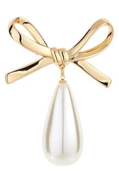 Elevate your ensembles with this bow-topped brooch glowing with a teardrop imitation pearl Imitation pearl/goldtone plate Imported Hispanic & Latinx Owned/Founded Chic Gold Brooch For Evening, Chic Gold Brooches For Party, Gold Pearl Brooches For Party, Gold Bow Brooch For Party, Elegant Pearl Brooches For Party, Carolina Herrera, Gold Tones, Nordstrom, Free Shipping