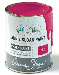 an open can of annie sloan chalk paint on a white background with pink and gray accents