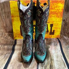 Corral Distressed Turquoise Boot - G1184 A Dash Of Color And An Intricately Embroidered Motif Lends A Feminine Appeal To Your Ensemble When You Don These Supple Leather Boots In Distressed Turquoise. 2'' Heel 12'' Shaft 14'' Circumference Pull-On Snip Toe Full Grain Leather Upper Leather Lining Leather Sole Made In Mexico Western Turquoise Boots With Patina, Turquoise Western Boots With Patina, Fitted Turquoise Boots For Ranch, Western Green Snip Toe Boots, Western Turquoise Boots For Rodeo, Blue Patina Boots With Round Toe, Turquoise Western Boots For Ranch, Western Green Boots With Leather Sole, Turquoise Leather Boots For Western-themed Events