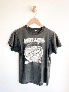 Original Grateful Dead t-shirt from the 1978 "On The Road" tour. Perfectly faded. Made in USA. Fabric: CottonFit: S Measurements: Bust 35" Shoulder 15.5" Sleeve (from collar) 10.5" Length 23.5" Waist 35" Condition: Very good. Underarm seams pulling very slightly apart and one small hole in graphic (see photo). Faded Washed Band Merch T-shirt, Vintage Faded T-shirt With Screen Print, Faded Crew Neck T-shirt Band Merch, Vintage Washed Black T-shirt For Concert, Vintage Graphic Print T-shirt For Fall, Vintage Concert T-shirt For Fall, Vintage Fall Concert T-shirt, Faded Band Merch T-shirt For Streetwear, Relaxed Fit Washed Black Band Merch T-shirt