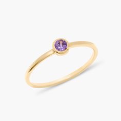 Introducing the Eden Vermeil Birthstone Ring! This one-of-a-kind ring features a custom gold band with a stunning birthstone for a truly unique and personal touch. Perfect for adding a little sparkle and personality to any outfit. Available in 14k gold vermeil Band width: 1mm 3mm cubic zirconia stone NOTE ﻿- Birthstone color may slightly vary per the color chart. SKU: BYR1132 Classic Amethyst Birthstone Promise Ring, Everyday Yellow Gold Crystal Ring With Birthstone, Yellow Gold Crystal Birthstone Ring For Promise, Fine Jewelry Birthstone Ring With Smooth Bezel, Yellow Gold Birthstone Crystal Open Ring, Gold Birthstone Ring With Smooth Bezel For Promise, Dainty Yellow Gold Amethyst Birthstone Ring, Anniversary Birthstone Ring With Smooth Bezel, Gold Gemstone Birthstone Ring