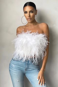 Ooze glamour and style with BARBARA Feather Crop Top. For a look that's beyond extra, this eye-catching full feather top is a sure-fire way to ensure all eyes on you as you step out to meet the girls at the bar or a romantic night with bae. Worked in our luxurious feathers this statement bandeau crop top works just as well with jeans as it does styled under a blazer and trouser combo for fashion week glam. Fabric | Real Ostrich Feathers Lining | Silk Polyester Elegant Crop Top, Feather Crop Top, Feather Top, Club L London, Feather Tops, Bandeau Crop Top, White Feather, Cropped Tops, White Feathers