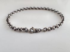 "Compact cable medium-weight chain minimalist sterling silver bracelet, unisex Choose your length: 5 ½, 6, 6 ½, 7, 7 ½, 8, 8 ½, 9, 9 ½, 10 inches. Unisex, for men or women Smaller link 4.3mm round cable chain but heavy gauge wire and compactly made, so it's a medium weight bracelet, still very comfortable to wear, with high-quality medium teardrop swivel clasp. Sterling silver has been medium oxidized, with subtle brushed finish and lightly polished, so has just a tad of rustic vintage feel. You Classic Sterling Silver Bracelet With Cable Chain For Everyday, Classic Sterling Silver Cable Chain Bracelet For Everyday, Everyday Sterling Silver Bracelet With Solid Link, Classic Sterling Silver Bracelet With Silver Chain For Everyday, Classic Everyday Sterling Silver Bracelet With Silver Chain, Classic Sterling Silver Bracelet With Lobster Clasp For Everyday, Sterling Silver Rolo Chain Bracelet For Everyday, Classic Sterling Silver Link Bracelet For Everyday, Sterling Silver Bracelet With Rolo Chain For Everyday