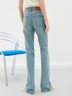 MO&Co. Women's Straight Leg Denim Jeans Features : - Asymmetric waistband- High waist, straight fit - Button and zip closure- Classic five-pocket design Code: MBD1JENT13The back length of size M(27) is 107cmMATERIALS & CARE Material: 99.2% Cotton 0.8% SpandexSeparate mild machine wash below 30°CDo not bleach, hang to dryDo not tumble dry, low ironDo not dry clean, do not expose to the sunWash the reverse side into the mesh bag, do not soakNotice:1. The parts of the leather tag cannot be ironed o Stretch Flare Jeans With Belt Loops, Fitted Rigid Denim Flare Jeans In Dark Wash, Fitted Flare Jeans In Dark Wash Rigid Denim, Fitted Straight Leg Jeans With Belt Loops, Spring Stretch Jeans With Belt Loops, Fitted Dark Wash Flare Jeans In Rigid Denim, Spring Straight Fit Rigid Denim Pants, Fitted Denim Blue Cropped Jeans With Frayed Hem, Fitted Cropped Jeans With Frayed Hem In Denim Blue