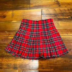 Never Worn, Red Plaid Brandy Melville Skirt, Size Small. Red Cotton Flared Skirt Bottoms, Red Cotton Lined Skirt, Red Cotton Skirt For Winter, Red Pleated Skirt For School In Spring, Casual Red Flared Skirt, Red High Waist Pleated Skirt With Lining, Red High Waist Pleated Mini Skirt, High Waist Red Skirt For Winter, Red High Waist Pleated Skirt