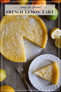 a slice of lemon tart on a plate next to sliced lemons and oranges