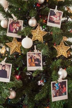 a christmas tree decorated with pictures and ornaments