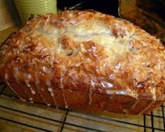 a loaf of bread sitting on top of a wooden table