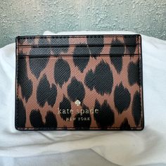 New Without Tags! Great For Every Day Use! Kate Spade Leopard Print Cardholder. Trendy Brown Card Holder For Travel, Chic Brown Card Holder For Everyday Use, Kate Spade Brown Rectangular Wallets, Trendy Brown Card Holder For Daily Use, Trendy Brown Card Holder With Card Slots, Chic Brown Card Holder With Card Slots, Chic Brown Card Holder With Slots, Kate Spade Card Holder For Everyday Use, Kate Spade Brown Everyday Wallet