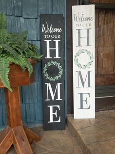 welcome to our home sign next to a potted plant on the front steps outside