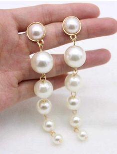 Pearl earrings bridal ear cuff white color Long earrings custom Pearl tassel earrings Wedding gift Wedding jewlery Oversized pearl earrings Processing: 3-5 days Feel free to convo us with any questions. Estimated shipping times United States: 7-14 business days Europe: 7-14 business days Australia, New Zealand and Oceania: 10-14 business days Asia Pacific: 8-14 business days Latin America and the Caribbean: 8-14 business days North Africa and the Middle East: 8-14 business days Sub-Saharan Afric Bride Earrings Pearl, Trending Earrings, Extra Long Earrings, Earrings For Wedding, Silver Bridal Earrings, Large Pearl Earrings, Long Pearl Earrings, Long Earring, Long Gold Earrings