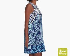 "This Hawaiian/Polynesian tribal A-line dress is retro looking featuring shades of blue floral design on dark blue background. If you would rather this dress was in another color or combination of colors please get in touch and let me know and I will do my best to accommodate you. The perfect sleeveless dress for daytime or evening wear, loose, swing fit that you can wear with or without leggings. The dress length in general is just a little above the knee. The dress is made out of 97% Polyester Blue A-line Sundress For Beach, Blue Hawaiian Dress With Tropical Print, Blue A-line Sundress For Vacation, Blue Hawaiian Printed Dresses, Blue Bohemian A-line Sundress, Polynesian Dress, Tiki Dress, Blue Floral Design, Hawaiian Dress