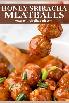 honey sriraca meatballs in a white bowl with a wooden spoon