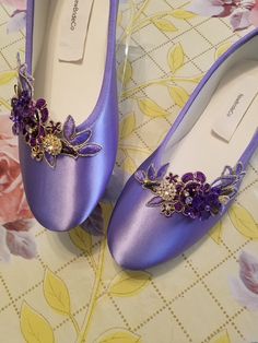 "Unique Purple shoes fit for a princess for an all day comfortable Special Day! Please look at all the pictures. US Size: 9M = inside length 10 3/8\" US Size: 11W (wide width 3.5\" at ball of foot) inside length: 10 3/4\" US Shoes Sizes: M5 - 10, 11, and 12. And 5W - 10W, 11W, and 12W. Colors: Purple as shown, Ivory/purple adornment, as shown Off-white/purple adornment,as shown Champagne/Purple adornment, as shown. To buy color swatches: computer screens make color vary, I suggest to contact to Purple Flat Shoes, Gold Flat Shoes, Gold Shoes Flats, Purple Flats, Creative Shoes, Shoes Purple, Wedding Flats, Purple Shoes, Colors Purple