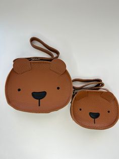 This adorable bear purse is made of PU leather and is very durable.  Perfect to match your little ones outfit.  This can be worn as a crossbody bag or shoulder bag.  It has a zipper closure to ensure all belongings are safe and an adjustable strap.   This is a gift for your little one especially on their birthday or holidays. Size: Small - 12 x 9.5 x 3cm / 4.72 x 3.74 x 1.18in Big - 16.5 x 12.6cm / 6.49 x 4.96in Cute Leather School Shoulder Bag, Cute Leather Shoulder Bag For School, Cute Animal Design Crossbody Shoulder Bag, Cute Brown Everyday Shoulder Bag, Cute Brown Crossbody Shoulder Bag, Cute Brown Bag With Adjustable Strap, Cute Brown Shoulder Bag, Cute Bear Design Bags For Gifts, Cute Bear Design Bags For Gift