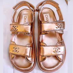 Brand New Authentic Chanel Gold Dad Sandals. Size 36. (They Run Large And Will Fit Size 6.5 To Size 7 Women’s Size.) Never Worn. Brand New In Box Plus Receipt. Selling Below Retail And Below What I Paid! Sold Out Everywhere!!!!!! Most Wanted Sandal!!!!! Luxury Gold Sandals For Summer, Designer Gold Open Toe Sandals, Designer Gold Closed Toe Sandals, Designer Gold Sandals With Round Toe, Designer Gold Flat Sandals, Luxury Round Toe Sandals For Summer, Luxury Gold Sandals With Round Toe, Luxury Gold Closed Toe Sandals, Luxury Sandals With Heel Strap And Flat Heel