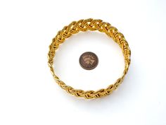 Vintage Fashion Jewelry - This is a wide gold tone bangle bracelet with a woven design. It is almost 1" wide, inside circumference is 8.25" Gold Metal Bangle Braided Bracelet, Gold Metal Braided Bangle Bracelet, Gold Bangle Bracelet, Woven Design, Bangle Bracelet, Bangle Bracelets, Gold Bracelet, Gold Tones, Fashion Jewelry