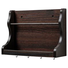 a wooden shelf with two hooks on the front and one hanging from it's side