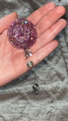 Purple sparkly  badge reel for your work id. Retractable, has a clip to latch onto your clothing. Super cute, handmade from resin Pink Handmade Badge Reel For Gift, Handmade Pink Badge Reel For Gift, Badge Holders Lanyard, Badge Holders, Badge Reel, Violet, Accessory Gift, Birthday Gifts, Electronic Accessories