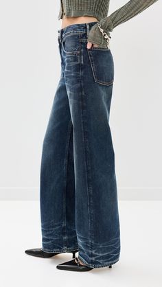 Find ACNE STUDIOS Broadway Denim Jeans on Editorialist. Fabric: Mid-weight, non-stretch denim. Fading and whiskering. Button fly. 5-pocket styling. Shell: 100% cotton. Wash cold. Made in Italy. Measurements: Rise: 11in / 28cm Inseam: 30.25in / 77cm Leg opening: 21.25in / 54cm Washed Blue Rigid Denim Jeans With Button Closure, Classic High Rise Blue Flare Jeans, Chic Dark Wash Cropped Jeans With Five Pockets, High Rise Washed Blue Jeans With Button Closure, Fall Washed Blue Rigid Denim Flare Jeans, Indigo Washed Jeans For Fall, Cropped Leg Flare Jeans In Dark Wash, Dark Wash Relaxed Fit Flare Jeans With Five Pockets, Dark Wash Rigid Denim Cropped Flare Jeans