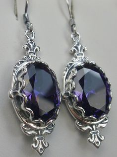 Purple Amethyst  Cubic Zirconia (CZ) Earrings Sterling Silver Filigree, Edwardian Jewelry, Pin Design#E18 with traditional Ear Wire Closures Elegant Purple Pierced Earrings, Ornate Purple Pierced Earrings, Ornate Purple Sterling Silver Earrings, Silver Crystal Earrings With Gemstones, Ornate Purple Jewelry With Matching Earrings, Oval Silver Crystal Earrings, Purple Cubic Zirconia Earrings For Pierced Ears, Fine Jewelry Amethyst Earrings For Pierced Ears, Elegant Purple Pierced Jewelry