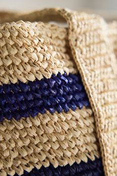 From beach days to weekend getaways, this spacious tote holds all the essentials in effortless style. Its woven raffia exterior is crisply striped and paired with a cotton lining. Tuck your sun hat under the wide straps to stay hands-free on the move. | Striped Raffia Travel Tote, Navy by Terrain in Blue, Women's, Cotton at Anthropologie Woven Raffia, Hand Poured Candle, Travel Tote, Wide Straps, New Love, Gift Accessories, Weekend Getaways, Sun Hats, Beach Day